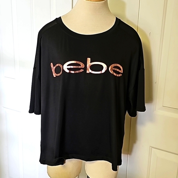 BEBE SPORT,crop top black short sleeves.  Size 2X. Very good used condition. - Picture 1 of 7